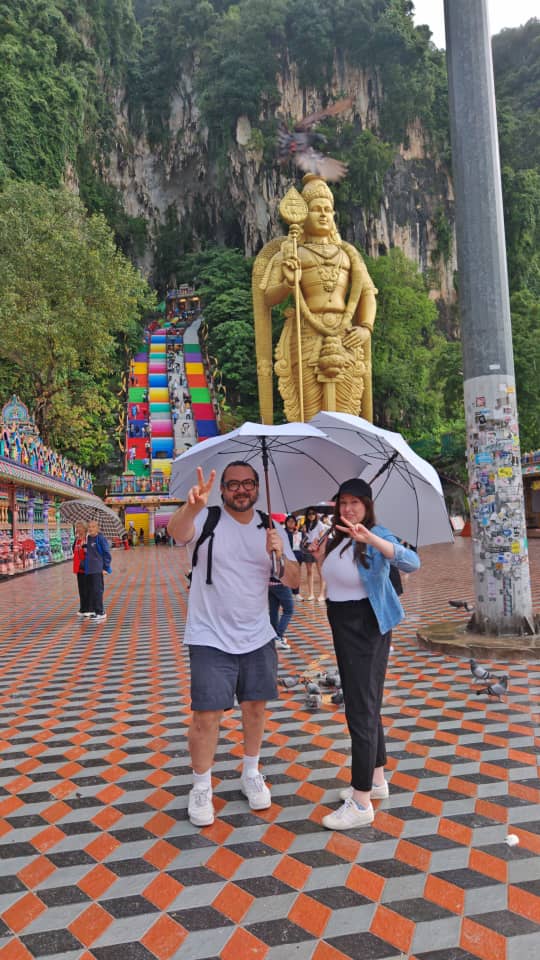 Batu Caves golden statue and steps – a must-visit during KL car hire.